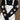 Black long-sleeved t-shirt with swans printed down each arm layered under off-white overalls.