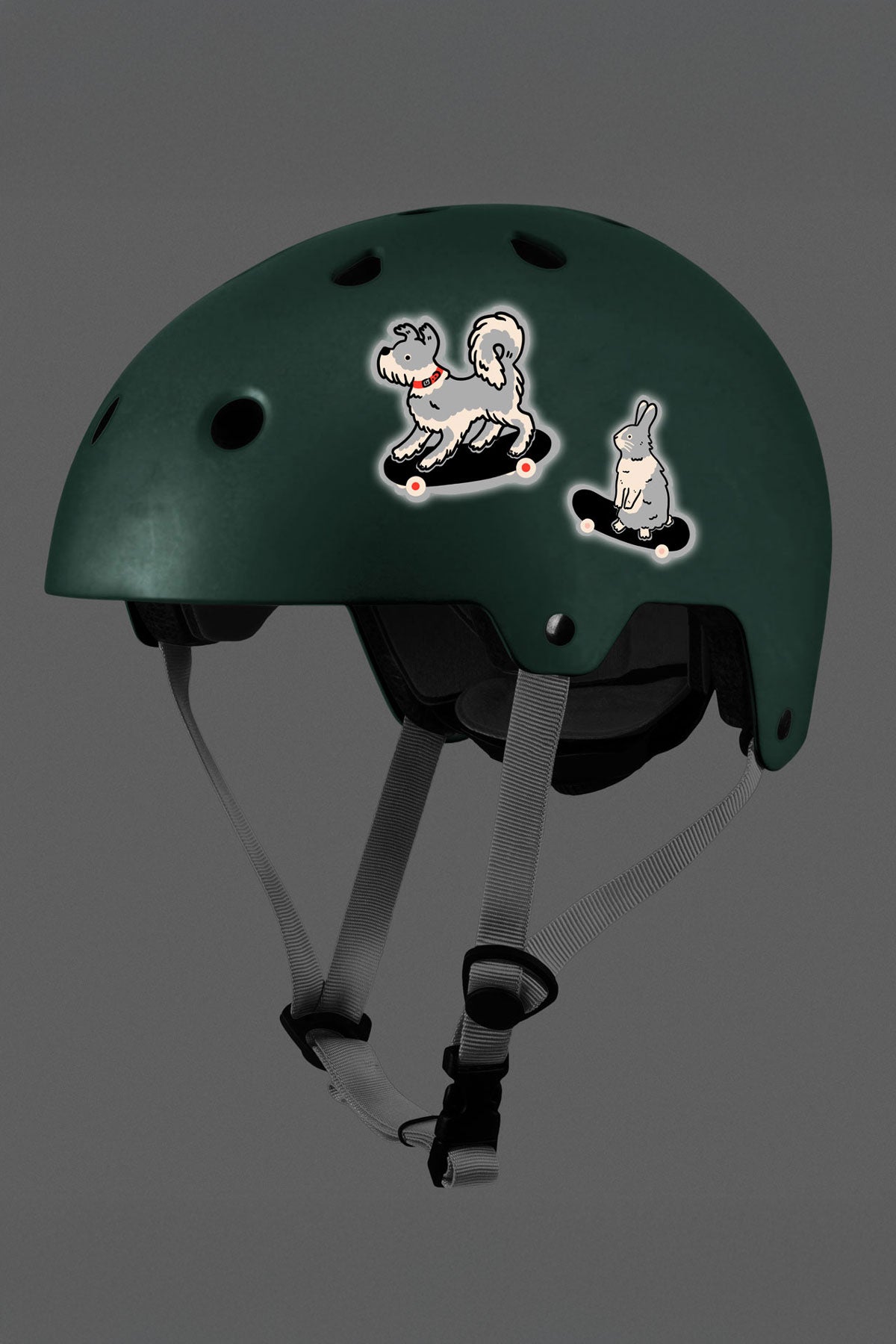 Reflective stickers of cute animals shown on a kids bike helmet