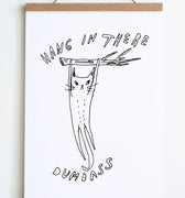 white background with loose line drawing in black of cat hanging from tree branch with text hang in there dumbass above and below image 