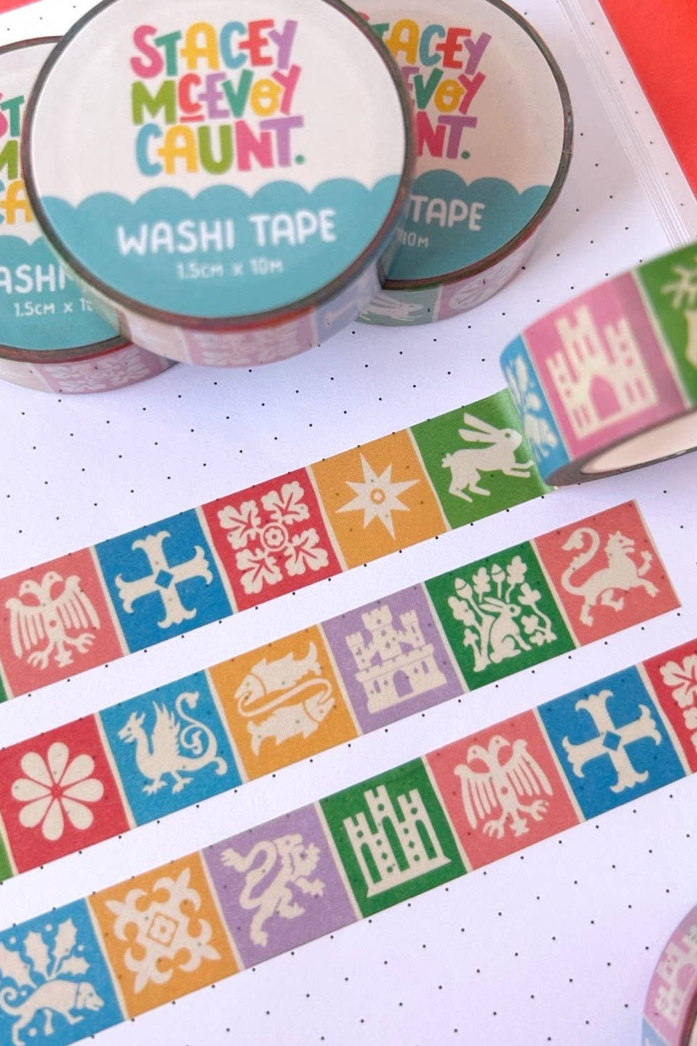 Colorful washi tape with decorative medieval inspired designs on a white surface