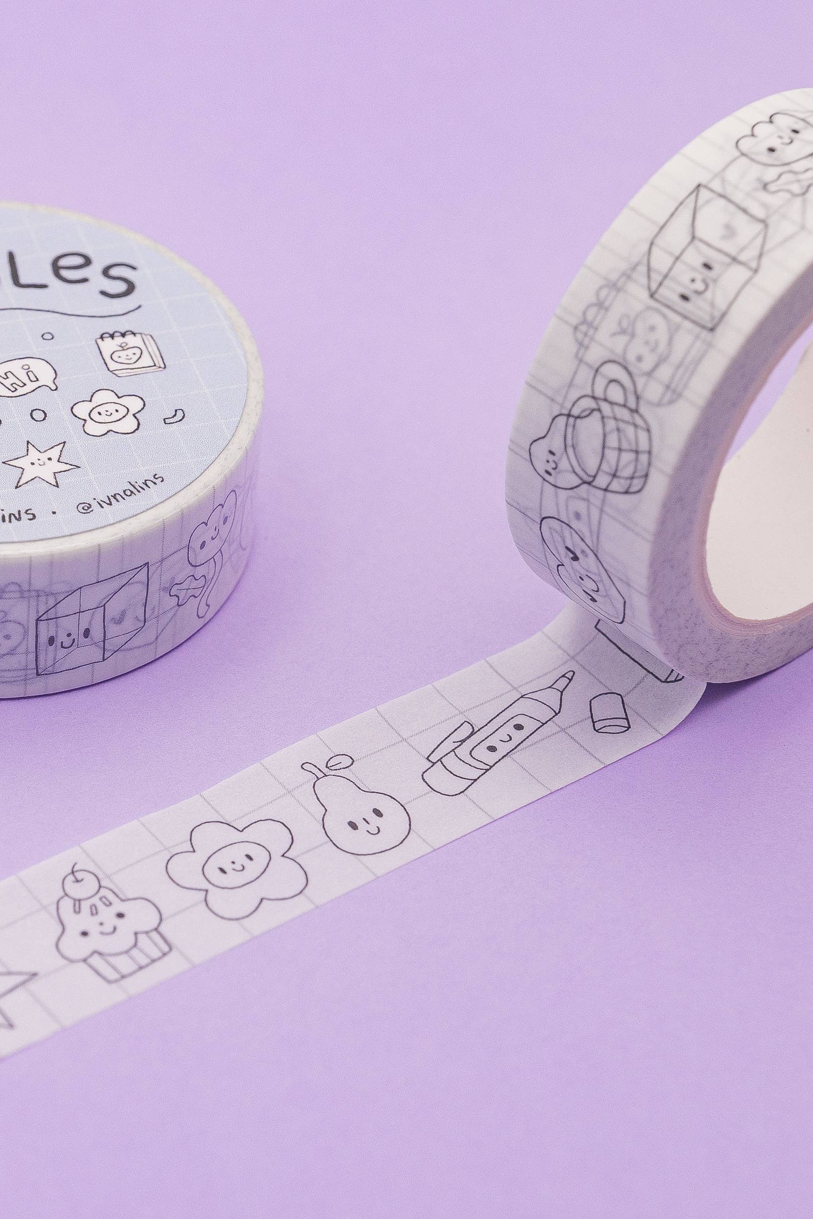 Washi tape with doodles on a purple background