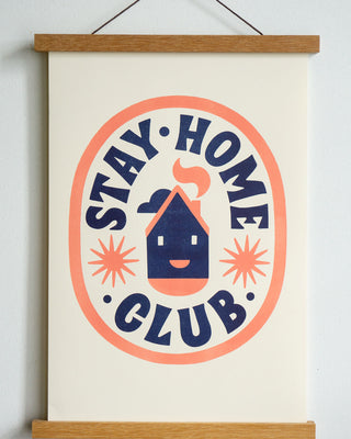 dark blue stay home club text in orange oval with house with smiley face and stars in the centre