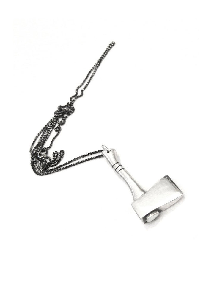 necklace with dark chain and polished silver axe pendant 