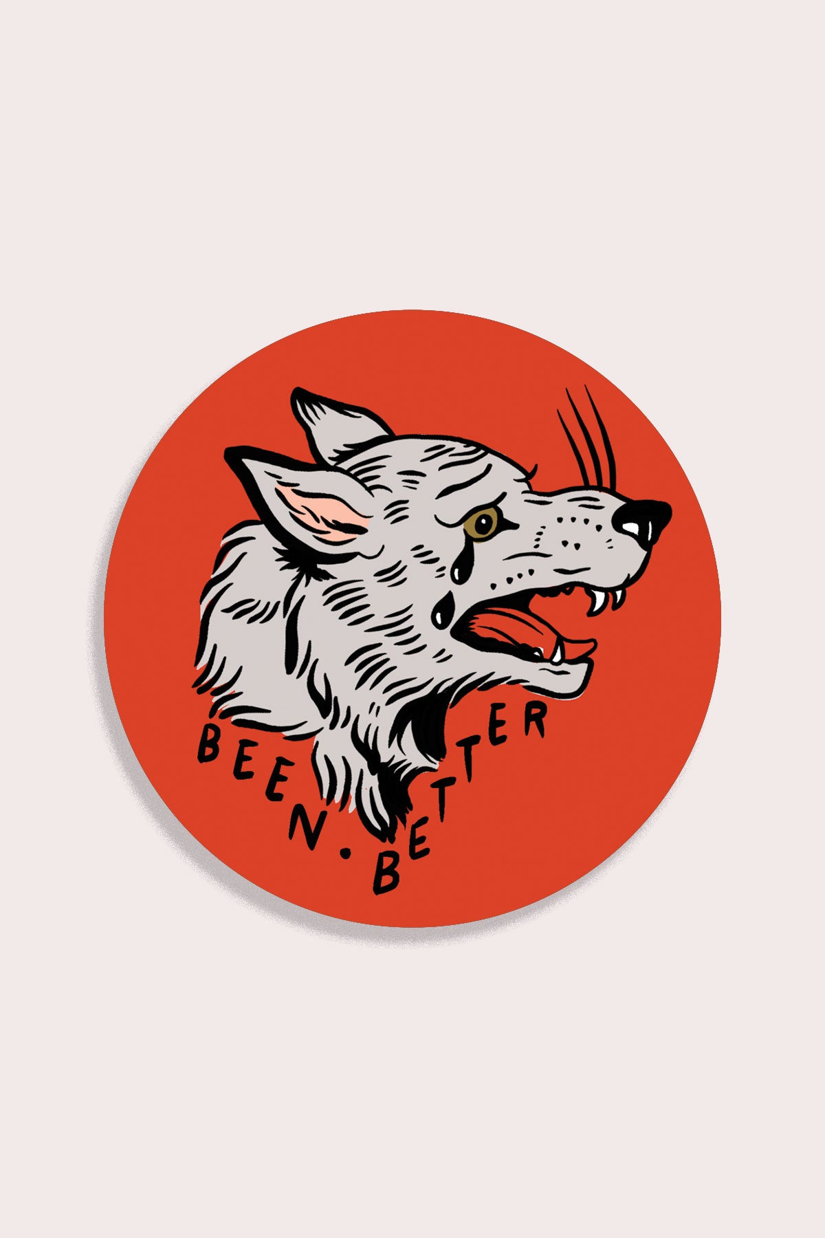 circular sticker of grey wolf with mouth open and black tears on red background with text reading "Been Better" 