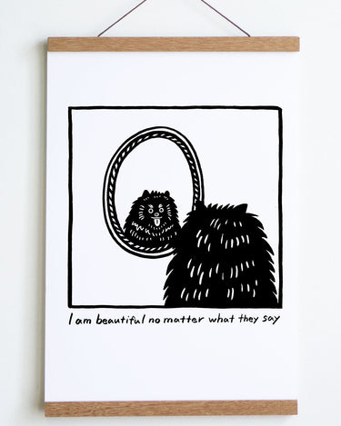 black line drawing in square of back of dogs head looking at reflection in oval mirror with tongue sticking out text underneath reads i am beautiful no matter what they say 